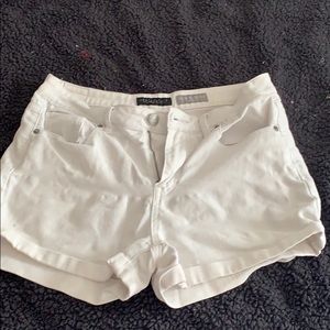 White, high waisted shorts.